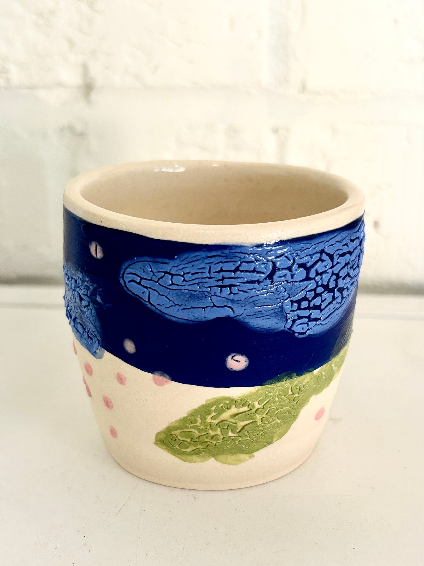 Pink Green and Blue Textured Cup